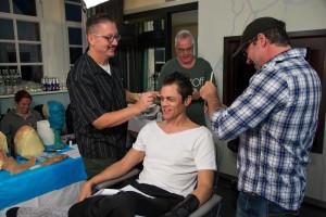 Steve Prouty and Bart Mixon apply makeup to Johnny Knoxville for Bad Grandpa.