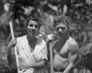 Dore Strauch and Friedrich Ritter holding tools in their garden at Friedo. Floreana Island, Galapagos. Circa 1932.