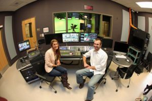 MCTV production manager Leslie Zules (left) and executive director Jonathan Grabowski show off the PEG organization's Broadcast Pix Granite X integrated production switcher. 