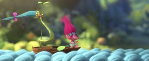 From left: Smidge, the teeny tiny Troll with a shockingly deep baritone voice (voiced by co-director Walt Dohrn) sings along with Troll princess Poppy (voiced by Anna Kendrick) in DreamWorks Animation’s TROLLS. Photo Credit: DreamWorks Animation.