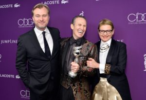 Costume designer Jeffrey Kurland (C), recipient of the Career Achievement Award, with director Christopher Nolan (L) and actor Dianne Wiest (Photo by Stefanie Keenan/Getty Images for CDG)